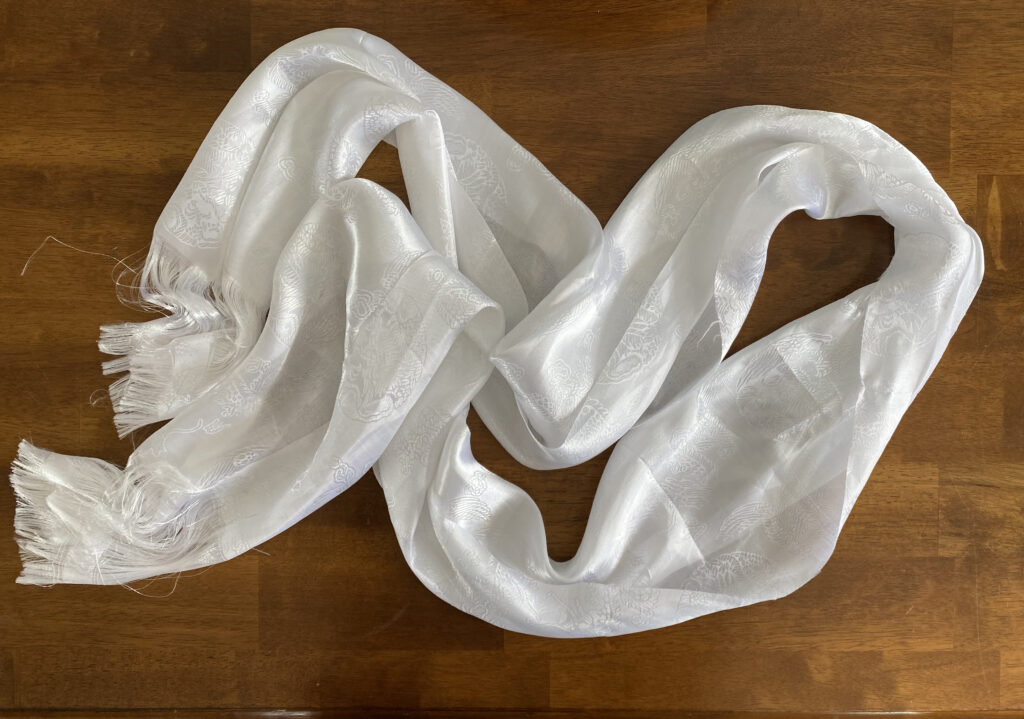 Edible Letters by Kathryn Stam, Figure 1. White khata scarf.